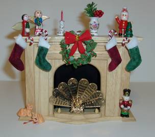 miniature fireplace with christmas stockings